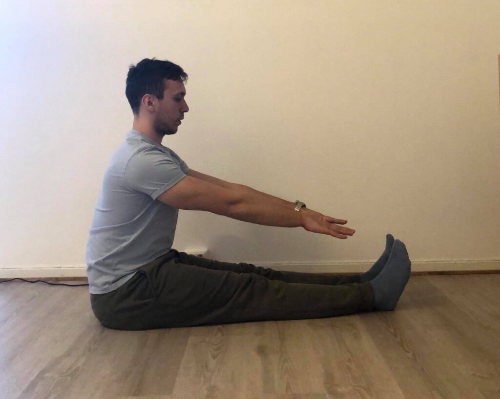 Static stretching seated hamstring stretch