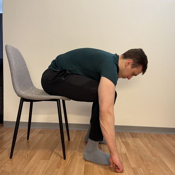sit to stand touching toes starting position- how to touch your toes