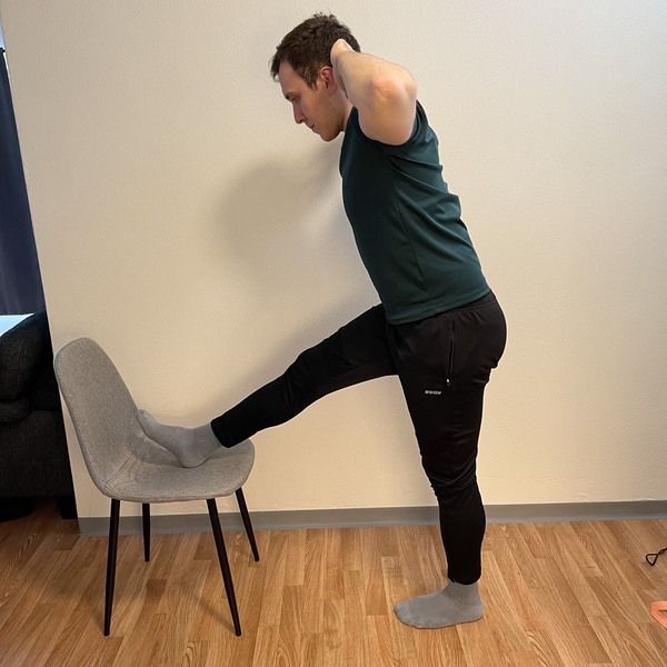 standing one leg dynamic hamstring stretch how to touch your toes