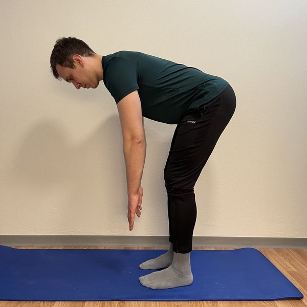 standing reach your toes exercise