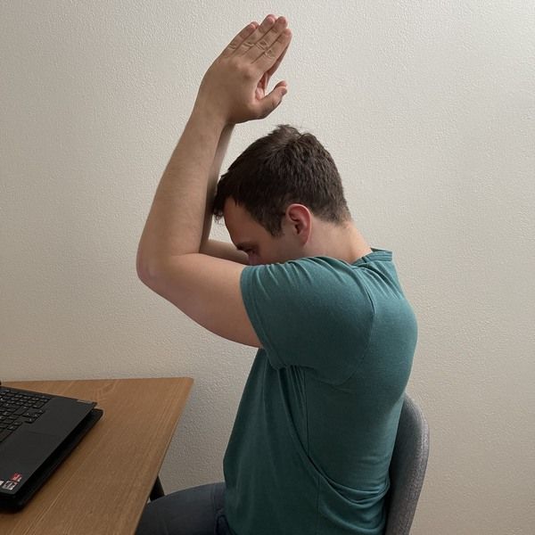 stretching exercises for zoom meetings neck flexion with arms