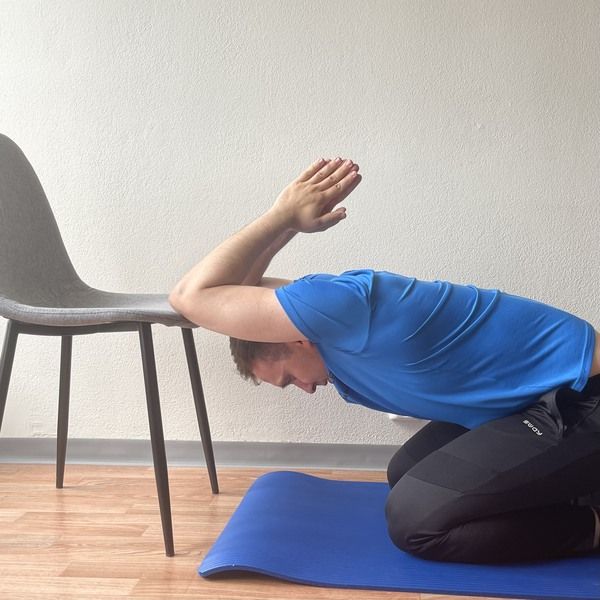 lat stretch exercise with chair