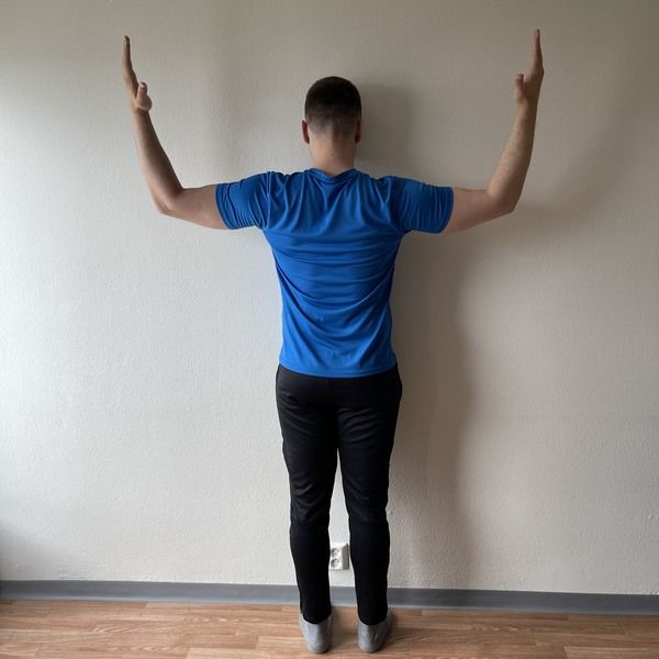 fix rounded shoulders with exercises - wall pull 90/90