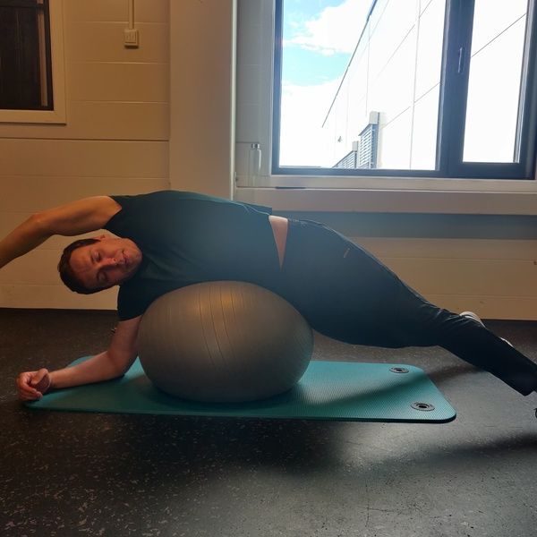 side lying QL stretch with Yoga Ball