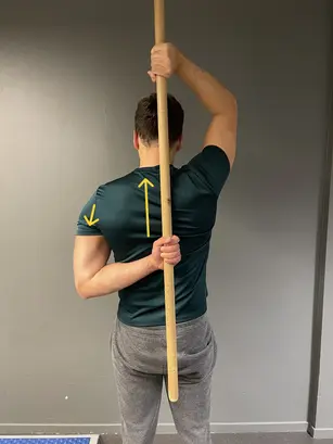 broom assisted infraspinatus stretch