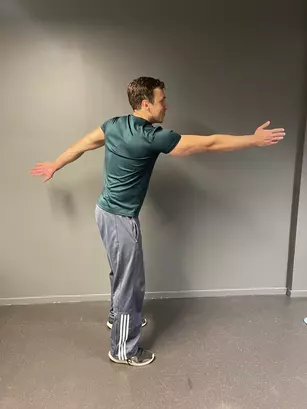 dynamic front arm swings pre run stretches