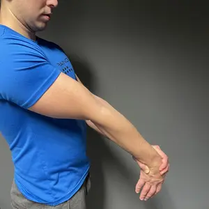 standing brachialis stretch